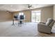 This basement has a walkout to the backyard and a comfortable seating area at 6265 S Ider Way, Aurora, CO 80016