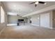 This is a large basement that is well lit, with neutral colors and ceilings fans at 6265 S Ider Way, Aurora, CO 80016
