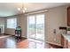 Bright dining area with sliding door access to the outdoor deck at 6265 S Ider Way, Aurora, CO 80016