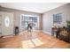 Bright living room with hardwood floors and bay window at 5191 S Pennsylvania St, Littleton, CO 80121