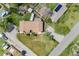 Aerial view of home with a spacious yard, garden and inviting neighborhood at 2837 Reed St, Wheat Ridge, CO 80033