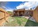 Spacious backyard with a covered patio, perfect for outdoor enjoyment at 2837 Reed St, Wheat Ridge, CO 80033