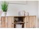 Contemporary media center with storage, shelving, and elegant decorative touches at 2837 Reed St, Wheat Ridge, CO 80033