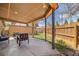 Covered patio with outdoor seating, perfect for entertaining and relaxing at 2837 Reed St, Wheat Ridge, CO 80033
