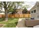 Inviting backyard with patio seating area, perfect for relaxing and enjoying the outdoors at 3365 S Grant St, Englewood, CO 80113