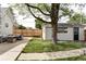 Well-maintained backyard featuring a spacious lawn and a charming shed, perfect for storage at 3365 S Grant St, Englewood, CO 80113