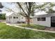 Expansive backyard with lush green lawn, perfect for outdoor activities and Gathering gatherings at 3365 S Grant St, Englewood, CO 80113