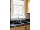 Close-up of the kitchen sink and faucet, showcasing the modern design at 3365 S Grant St, Englewood, CO 80113
