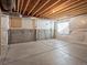 Unfinished basement with concrete flooring and exposed ceiling, ready for customization at 4837 S Buchanan St, Aurora, CO 80016