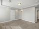 Bright, carpeted bedroom features recessed lighting, neutral paint, and paneled doors at 4837 S Buchanan St, Aurora, CO 80016