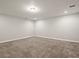 Large carpeted bedroom with recessed lighting and neutral paint at 4837 S Buchanan St, Aurora, CO 80016