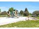 Well-equipped playground with slides and play structures, ideal for Gathering fun in a serene park setting at 3853 S Genoa Ct # D, Aurora, CO 80013