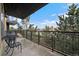 Private balcony with table and chairs at 9059 E Panorama Cir # B306, Englewood, CO 80112