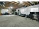 Finished basement with exposed ceiling, perfect for versatile use such as recreation or storage at 16048 Elizabeth St, Thornton, CO 80602