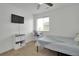 This bedroom offers a ceiling fan, and natural light at 16048 Elizabeth St, Thornton, CO 80602