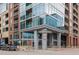Exterior view of Riverfront Athletic Club in a modern building with glass facade and brick accents at 1700 Bassett St # 802, Denver, CO 80202