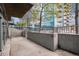 Large patio view with a partial view of an office building and trees at 1700 Bassett St # 802, Denver, CO 80202