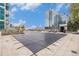 Rooftop pool area with lounge seating and city views in a modern building on a sunny day at 1700 Bassett St # 802, Denver, CO 80202