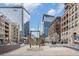 Downtown street view featuring modern architecture, sculptures, and city views at 1700 Bassett St # 802, Denver, CO 80202