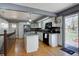 A full kitchen with a door to the outside at 1641 Orchard Dr, Denver, CO 80221