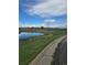 A scenic pond view in the surrounding community park at 1641 Orchard Dr, Denver, CO 80221