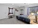 Cozy bedroom with a comfortable bed, stylish decor, and ample natural light at 14300 Waterside Ln # J4, Broomfield, CO 80023