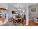 Dining area featuring seating for four, a plush rug, and natural light at 14300 Waterside Ln # J4, Broomfield, CO 80023