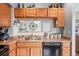 Kitchen view with a double sink and black dishwasher at 14300 Waterside Ln # J4, Broomfield, CO 80023