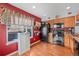 Well-lit kitchen with stainless steel appliances and bright accents at 14300 Waterside Ln # J4, Broomfield, CO 80023