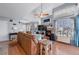 Bright living room featuring hardwood floors, a fireplace, and large windows at 14300 Waterside Ln # J4, Broomfield, CO 80023