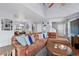 Spacious living room with hardwood floors, a comfortable couch, and an open floor plan at 14300 Waterside Ln # J4, Broomfield, CO 80023