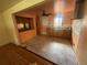 A simple kitchen features tile floor and orange walls at 888 Wolff St, Denver, CO 80204