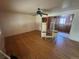Spacious living room with hardwood floors flowing into an open-concept kitchen at 888 Wolff St, Denver, CO 80204