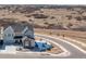 Charming two-story home with stone accents and attached garage located on a cul-de-sac at 7517 Copper Sky Ct, Castle Pines, CO 80108