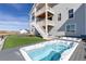 Backyard with lush lawn and hot tubs, perfect for relaxation and outdoor entertainment at 7517 Copper Sky Ct, Castle Pines, CO 80108