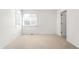 Neutral bedroom featuring bright windows and carpeting at 11945 W 66Th Pl # A, Arvada, CO 80004