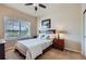 Cozy bedroom featuring comfortable bed, natural light and closet at 2872 Dreamcatcher Loop, Castle Rock, CO 80109