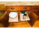 Wooden cabinets with pull out shelving and drawers at 2872 Dreamcatcher Loop, Castle Rock, CO 80109
