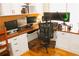 Spacious home office desk with dual monitors and ample workspace at 2872 Dreamcatcher Loop, Castle Rock, CO 80109