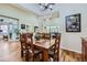 Spacious dining room with a large wooden table and a view of the living area at 2872 Dreamcatcher Loop, Castle Rock, CO 80109