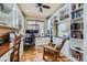 Home office featuring custom built-in bookshelves, cabinets, and dual desks at 2872 Dreamcatcher Loop, Castle Rock, CO 80109