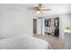 Spacious main bedroom features a ceiling fan and walk-in closet with plenty of storage at 15107 E Wesley Ave, Aurora, CO 80014