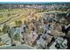 Picturesque aerial view of a residential neighborhood near a golf course and cityscape at 210 S High St, Denver, CO 80209