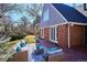 Inviting backyard with brick patio and stylish outdoor seating, perfect for relaxation at 210 S High St, Denver, CO 80209