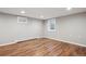 Finished basement with neutral walls, recessed lighting, and wood-look flooring for a modern feel at 210 S High St, Denver, CO 80209