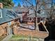 Charming brick home with well-manicured front yard and inviting entrance at 210 S High St, Denver, CO 80209