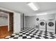 Finished laundry room with side-by-side washer and dryer hookups and a utility sink at 210 S High St, Denver, CO 80209
