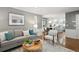 Comfortable living room with hardwood floors, stylish furniture, and ample natural light at 210 S High St, Denver, CO 80209