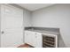 The basement wet bar area provides a practical and stylish space for entertaining at 210 S High St, Denver, CO 80209