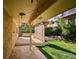 Covered back deck with wood tile and lighting, great for outdoor entertaining at 14072 W Alaska Dr, Lakewood, CO 80228